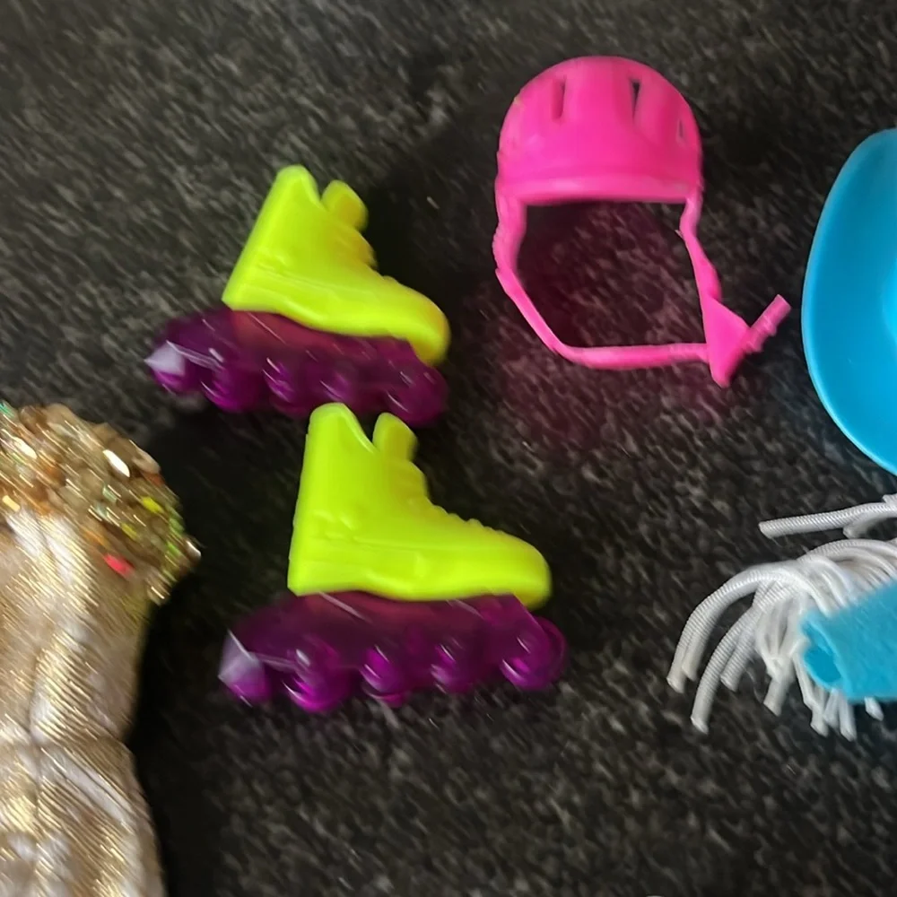 Vintage 1990s Barbie doll bundle of accessories. Gown, rodeo, Baywatch, skater.